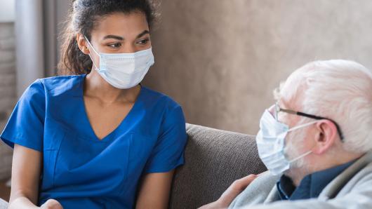 A doctor consulting with a patient.