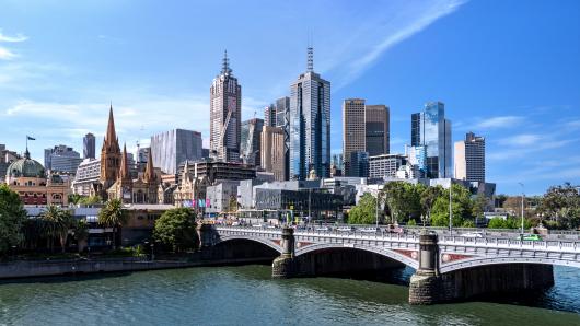 the Melbourne skyline and a river in the foreground