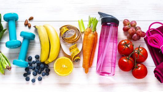 fruits, vegetables, weights ad water bottle