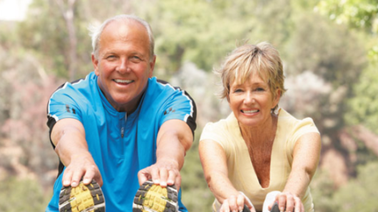 Adult couple stretching