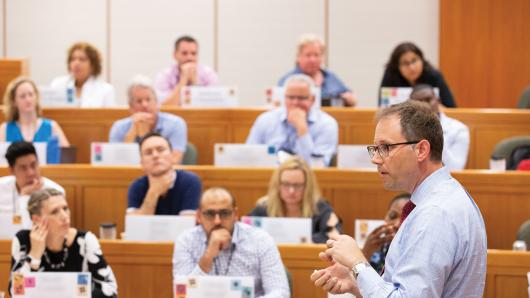 Professor Bruell teaching to a class of executives