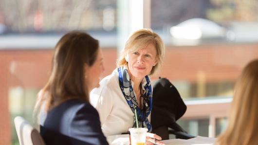 Two female executives in conversation